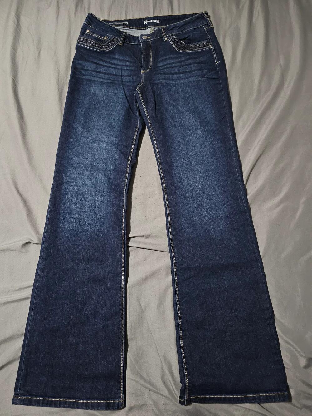 Revolution by Ricki's dark wash bootcut jeans with front embellishment